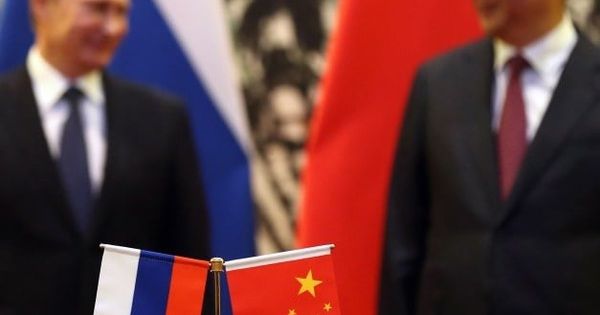 Các công ty Trung Quốc quay cuồng tìm kênh ngầm để giao dịch với Nga