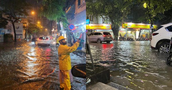 Nhiều tuyến phố Hà Nội ngập sau trận mưa lớn, người dân bì bõm di chuyển khó khăn